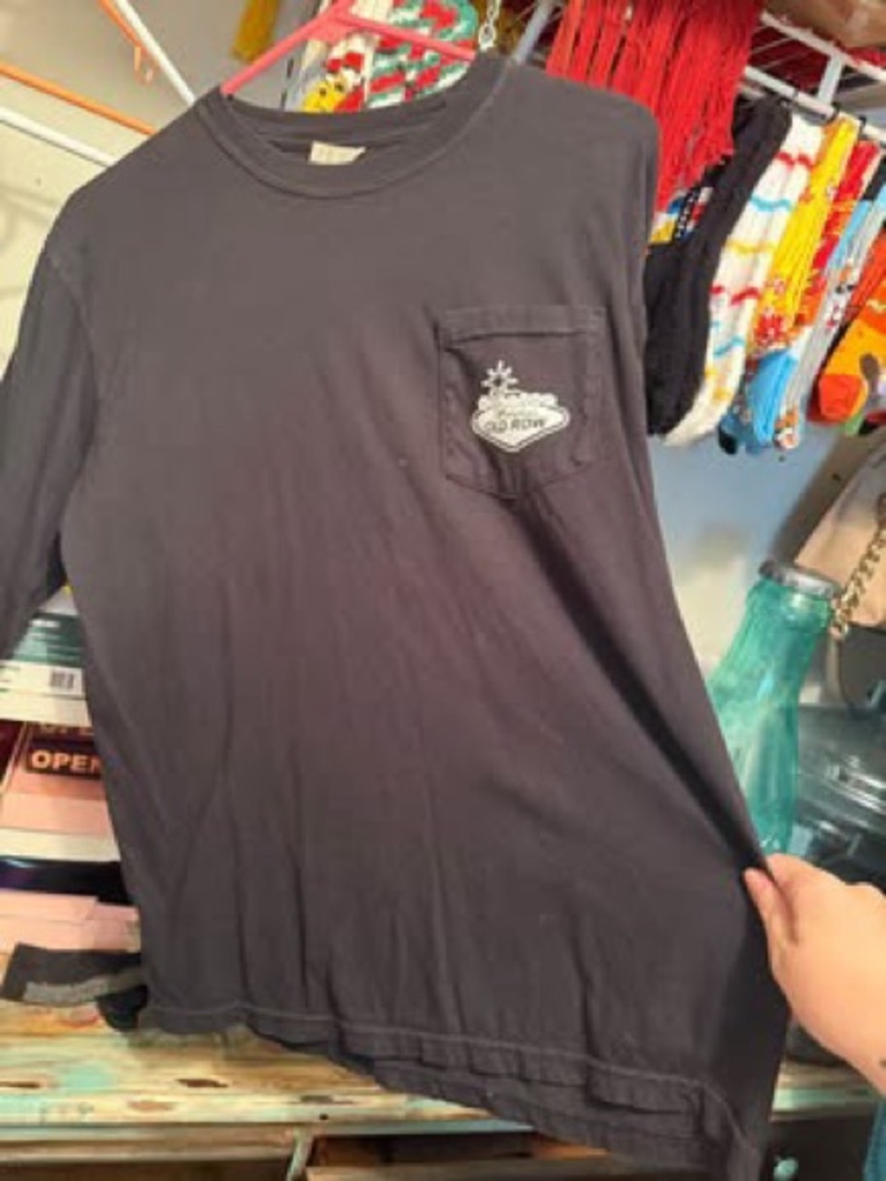 Men's Black Long Sleeve Pocket Tee with Small Chest Emblem